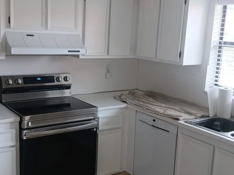 Kitchen cabinets after Perry Painting refinishing