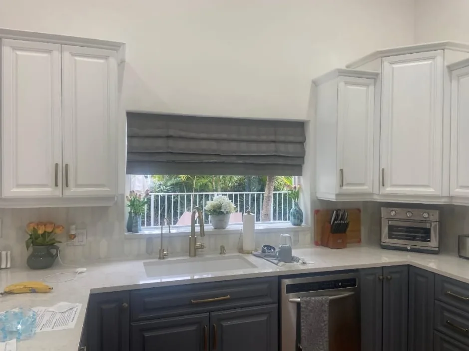 Refinished white-and-gray kitchen cabinets