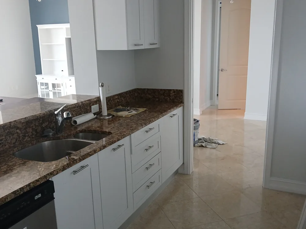 Kitchen cabinets refinished bright white